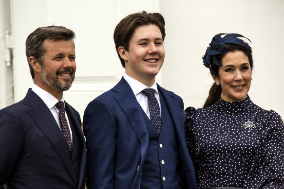 Crown Princess Mary and her son Prince Christian of Denmark  together with his father, Crown Prince Frederik, at left. 