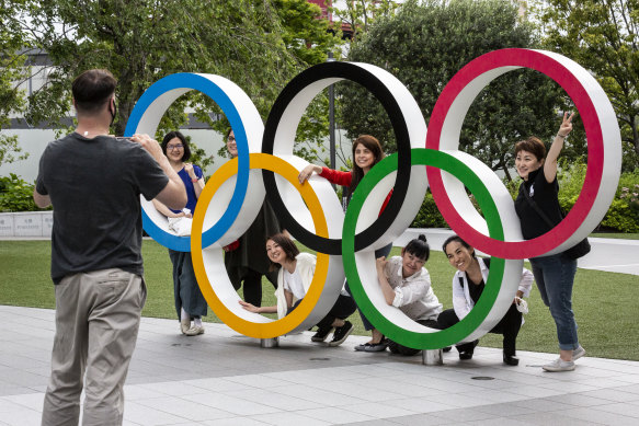 People have their photographs taken in Tokyo.