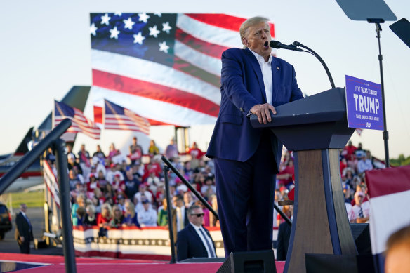 Former president Donald Trump speaks at a campaign rally at Waco Regional Airport.