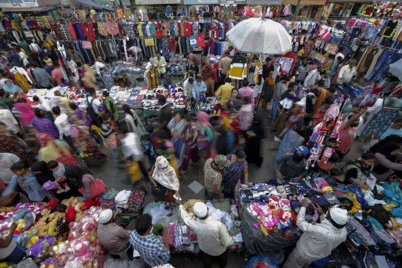 Indians throng a market for shopping ahead of Hindu festival Diwali in Ahmedabad. Officials are worried the festival will be a coronavirus superspreader event.