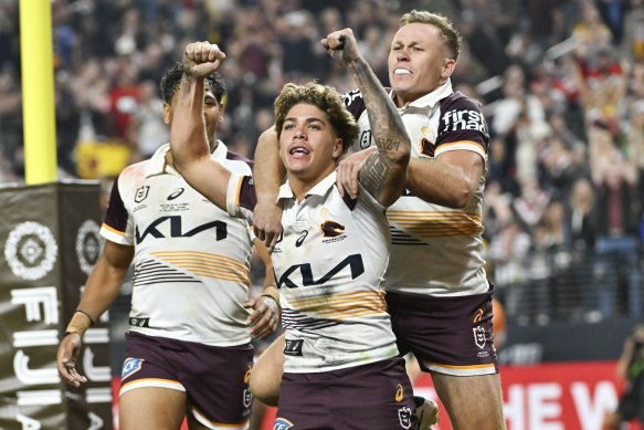 Reece Walsh celebrates a try in the Broncos’ defeat to the Roosters in game two.