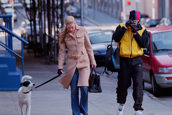 Carolyn Bessette Kennedy wearing the recently auctioned Prada coat in 1998 with John F. Kennedy Jr in Tribeca, New York.