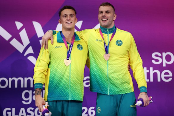 Flynn Southam (gold) and Kyle Chalmers (bronze) during the Australian national anthem. 