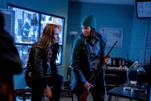 Melanie Scrofano and Katherine Barrell in the fantasy-horror series Wynonna Earp.