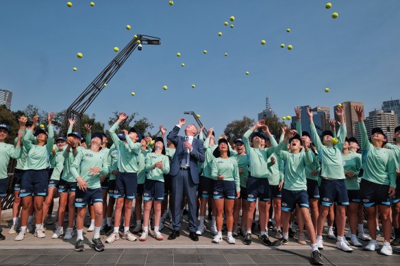 Tennis Australia’s Craig Tiley with  Australian Open 2020 Kia ballkid squad members in Melbourne Park on Tuesday. 