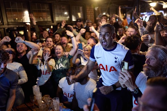 Spurs fans celebrate at full time in the Beehive Pub, Tottenham.