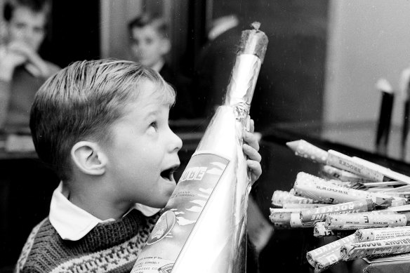 Greg James buys fireworks at David Jones in Sydney on 20 May 1959.