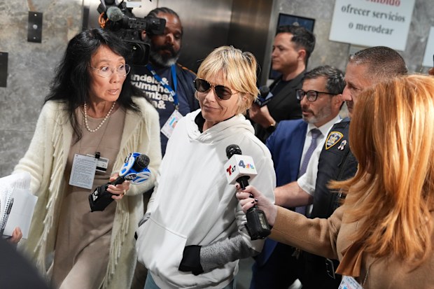 Selma Blair leaves court on Monday, Oct. 12, 2026, in New York after her arraignment on charges of injuring two flight attendants during a cross-country flight. (AP Photo/Ryan Murphy)