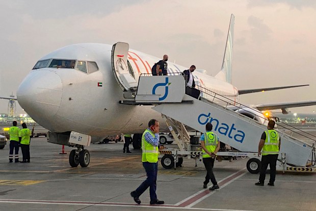  Israeli tourists leave a FlyDubai plane which departed from Ben-Gurion International Airport in Tel Aviv and landed in Dubai, United Arab Emirates, Nov. 8, 2020.