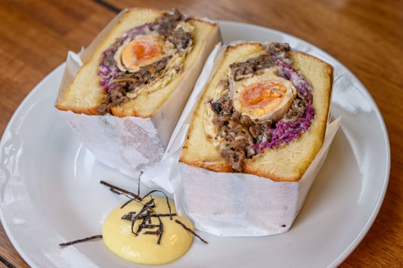 Korean-style beef bulgogi sandwich with tea-marinated boiled egg.