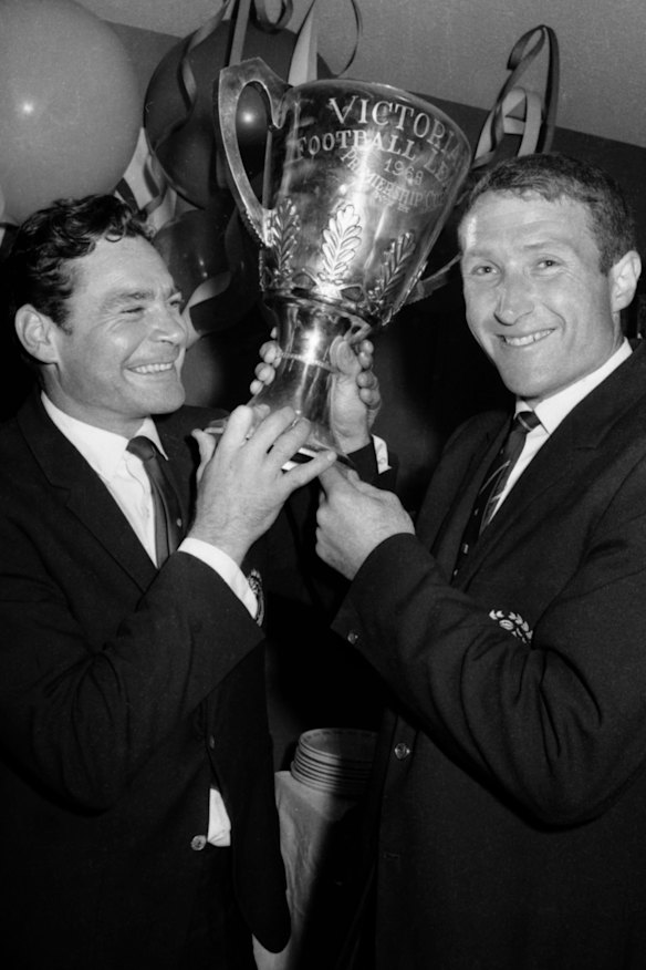 Carlton coach Barassi and captain John Nicholls with the 1968 Grand Final trophy, won over Essendon. It was the club’s first VFL grand final win for 21 years.