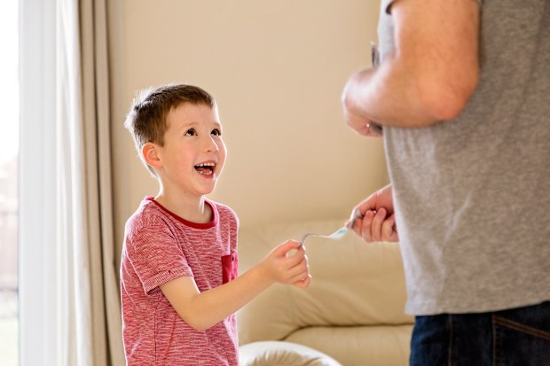 child given money by parent pocket money dad son
