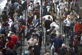 Domestic passengers faced long queues at Sydney Airport early on Saturday afternoon.