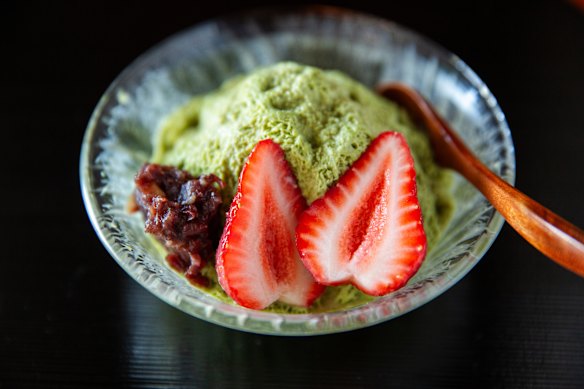 Matcha kakigori with sweet red bean paste.