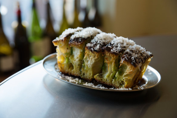 Leftover Casa focaccia becomes terrific garlic bread ($12) doused in a verdant green butter high on garlic, chopped herbs and spring onion. 