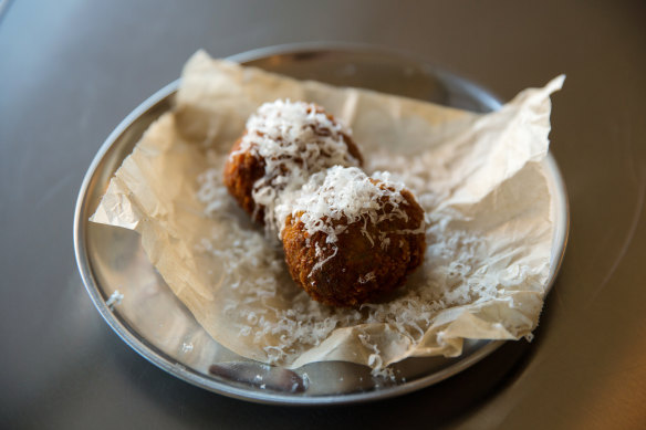 French onion soup arancini ($12 for two) made with first-use arborio rice rather than leftover risotto.