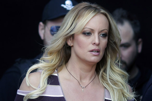 Stormy Daniels tells a story of sex with Trump as he listens in disgust