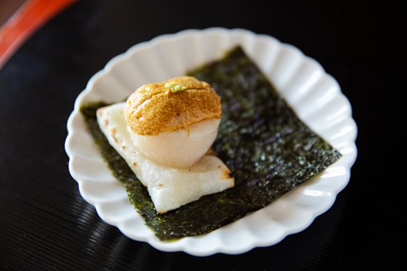 Seafood grilled over binchton charcoal is a key part of the playbook.