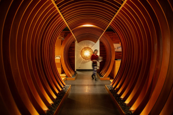 James Parker’s warm lighting, concrete shell and timber accents give it a real art installation quality. 