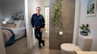 Architect Craig Muir in the bathroom at his home that he designed for his 11yo daughter who was diagnosed with juvenile arthritis.