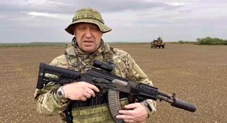 Yevgeny Prigozhin, the owner of the Wagner Group military company speaks to a camera at an unknown location. 