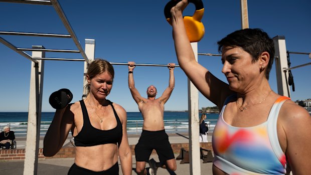 Virginia Venn, Joey Pamment, and Louise Brandon pictured at the outdoor gym at Bondi Beach.