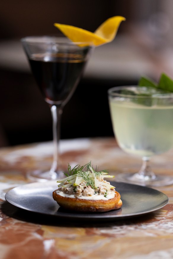Spanner crab blini with apple is part of the snack-focused menu.