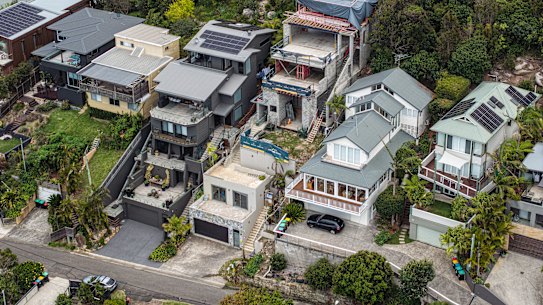 An aerial view of the Newport home at the centre of controversy over unauthorised works. Home in question is third from the right.