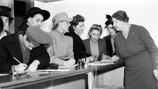 Recruits for the Australian Women’s Army fill in enrolment forms at the Sydney headquarters of the Women’s Voluntary National Register at the Bank of NSW on O’Connell Street, Sydney, on August  25, 1941. 