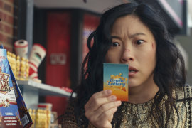 Katie Kim (Awkwafina) discovers she has won the lottery in Jackpot!