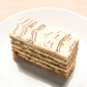 Esterhazy cake with walnut meringue and lemon buttercream.