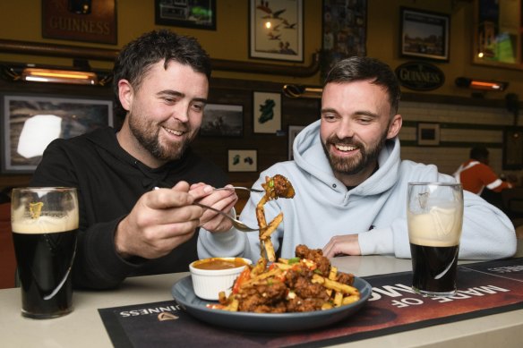 Cammy Millar and Sean Coughlan share Shea’s Irish pub spice bag.