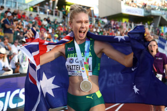 Eleanor Patterson celebrates her high jump gold medal at the world championships.