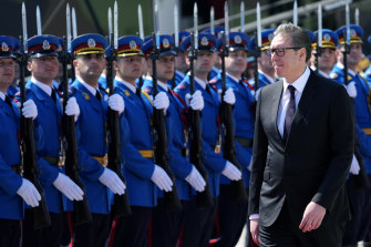 Serbian President Aleksandar Vucic reviews the honour guard during a welcome ceremony before the military exercises on Batajnica, military airport near Belgrade, Serbia, on Saturday. Although Serbia officially seeks membership in the European Union, it has been arming itself mostly with Russian and Chinese weapons.