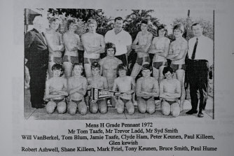 Jamie Taafe, back, fourth from left, in a 1972 swimming team with his father Tom Taafe standing far left.