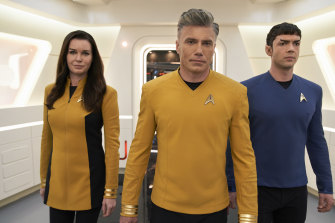 Rebecca Romijn as  Number One, Anson Mount as Captain Pike and Ethan Peck as Mr Spock in Star Trek: Strange New Worlds.