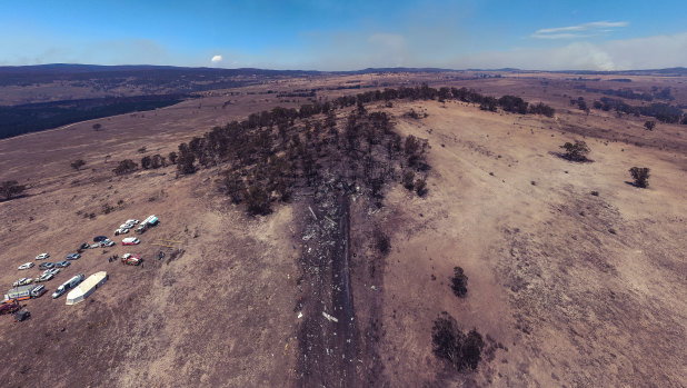 Aerial footage of the January's C-130 crash site reveals the extent of the impact.