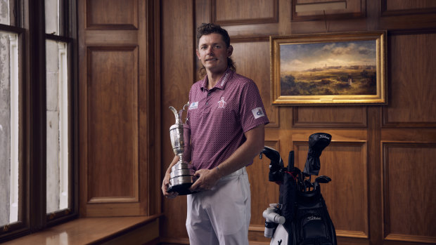 Cameron Smith with the Claret Jug in the clubhouse at St Andrews, Scotland after his 2022 victory.