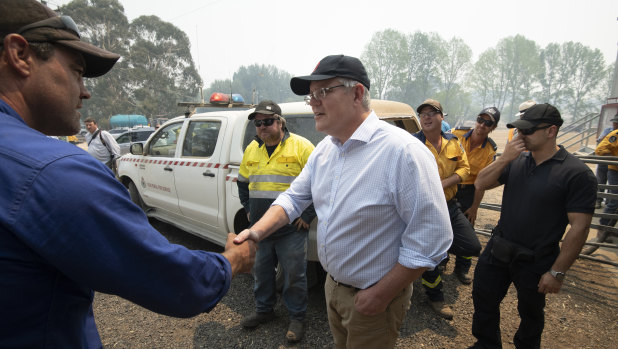Prime Minister Scott Morrison meets NSW Rural Fire Service volunteers in the Blue Mountains on December 23.