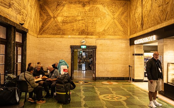 A frieze in the Central station cafe that was rediscovered after a 2015 fire at Hungry Jack’s in the same location.