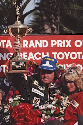 Alan Jones celebrates winning the United States Grand Prix West on March 15, 1981.