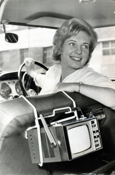 TV set installed in a car driven by Janice Irvine of Greenacre, May 2, 1963