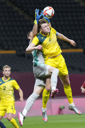 Socceroos centre-back Harry Souttar, right, in action at the Tokyo Olympics. 