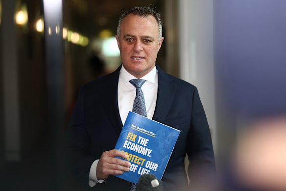 Wilson with the pamphlet earlier today.