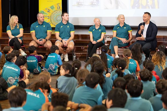 Newington State School students listen to Ian Thorpe and other Olympians on the 25th anniversary of Sydney 2000. 