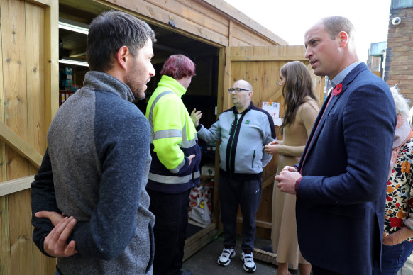 Prince William speaks with a service user during a visit to The Rainbow Centre in Scarborough, England.