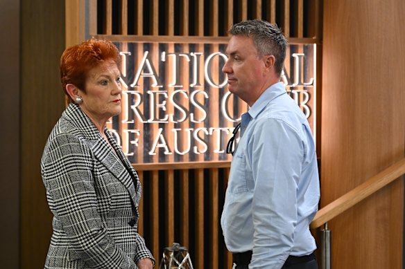 Pauline Hanson speaks to consultant James Ashby ahead of her speech at the National Press Club in Canberra in June.