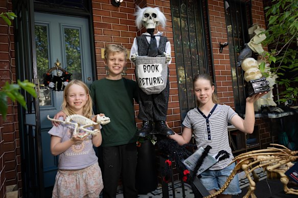 Young Halloween fans get into the spirit outside their Annandale home this week.