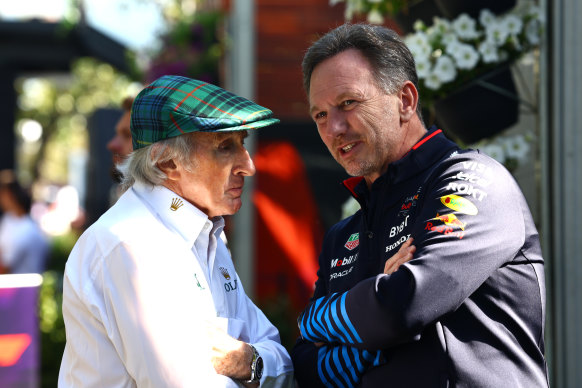 Red Bull Racing team principal Christian Horner talks to Sir Jackie Steward at the Australian Grand Prix. 