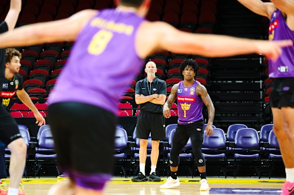 Brian Goorjian pauses to watch a play at Sydney Kings training.